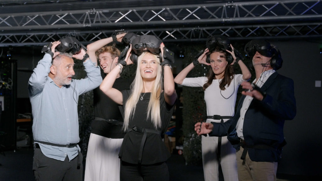Family friends playing virtual reality